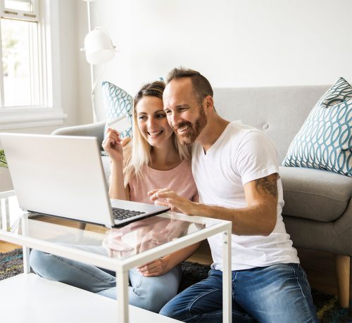 Couple On Computer - Low Mortgage Rates